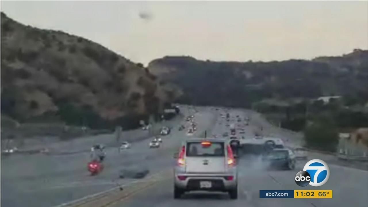 VIDEO Motorcyclist kicks car, triggers chainreaction crash on 14