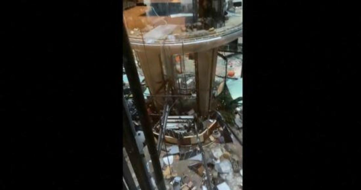 Aquarium in lobby of Berlin Radisson Blu hotel building bursts, forcing