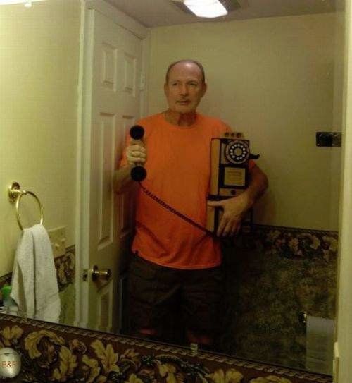 Old man old phone selfie in the bathroom 2013 07 24