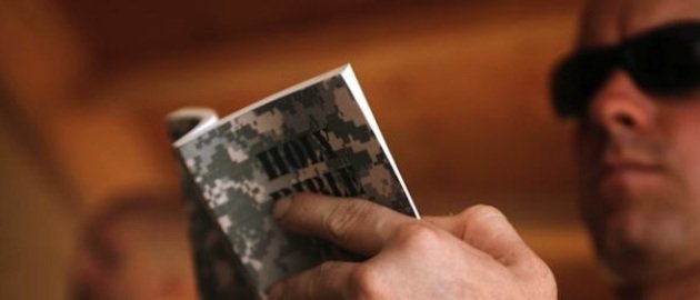 Atheists want guard to stop bible handouts what is your opinion