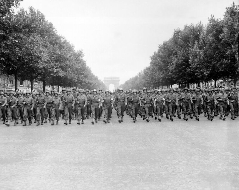 966px american troops march down the champs elysees