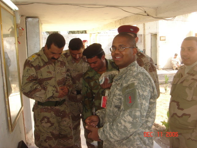 Ssg reyes deliveriing medical supplies at the hq compound abu skyar 11dec06